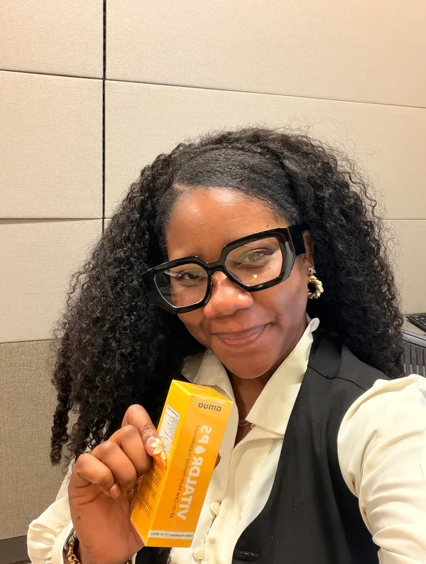 Elsa T holding Amua Vitaldrops